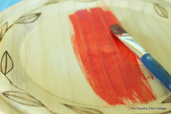 RIT Dye on Fall Plates -- RIT dye will stain wood! Use it to make these fun plates in fall colors!