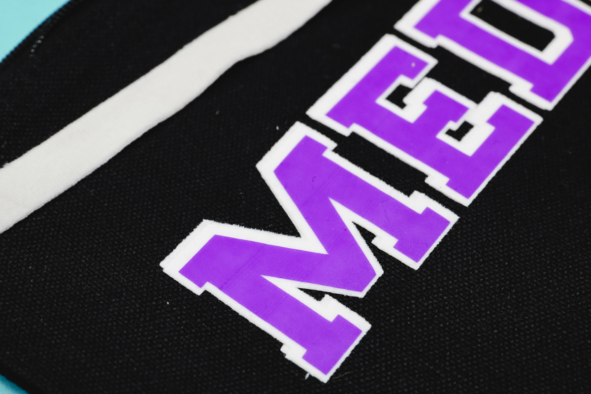 Embossing stripes in HTV with ribbon.